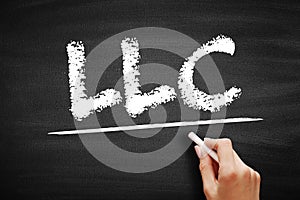 LLC Limited Liability Company - form of a private limited company, acronym text concept on blackboard