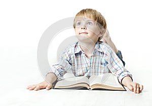 Llittle child reading book and dreaming