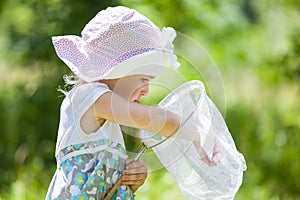 Llittle girl with butterfly net