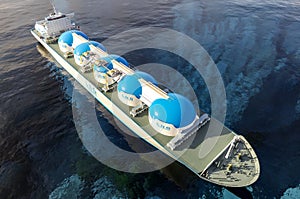 LNG - Liquified natural gas tanker with gas tanks powered with h2 hydrogen engines on the ocean, deliver LNG