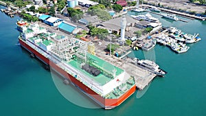 LNG ship in Bali, Indonesia docked in port in Benoa