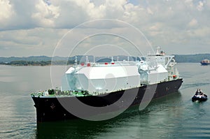 LNG tanker ship transiting through Panama Canal.