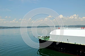 LNG tanker ship transiting through Panama Canal.