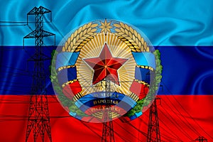 Lnr flag in the background Conceptual illustration and silhouette of a high voltage power line in the foreground a symbol of the