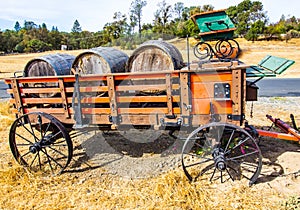 Load Of Old Wooden Wine Barrels In Vintage Wagon