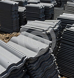 Load of roofing tiles at a residential home construction site.