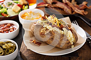 Loaded baked potato with bacon and cheese