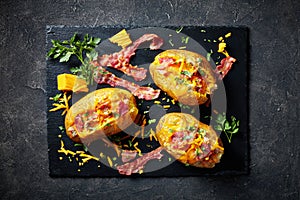 Loaded Baked Potatoes with Bacon, cheese, meat