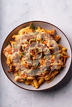 Loaded dirty vegan fries with fermented cabbage, hot mayo and crunchy coconut flakes