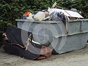 Loaded dumpster filled with rubble dumpster, recycle, waste and garbage