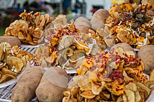 Loaded fried potatoes with cheddar and bacon at the county fair