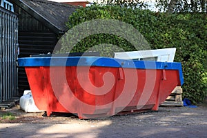 Loaded garbage dumpster