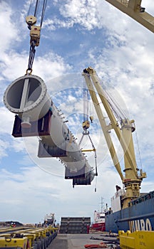 Loaded onto huge multi wheeled heavy haulage trucks are these huge refinery storage vessels.