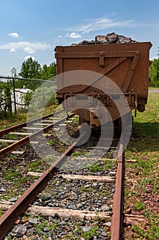 Loaded Ore Cart on Railroad Tracks