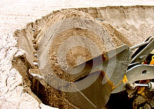 Loader bucket. Loading sand mining operations