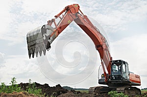 Loader excavator at construction