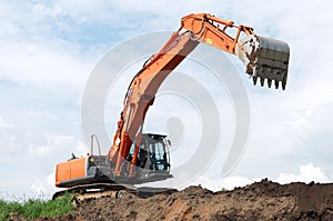 Loader excavator at construction