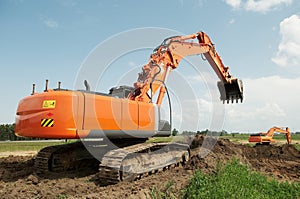 Loader excavator at construction