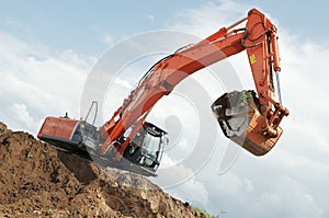 Loader excavator at construction