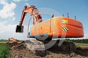 Loader excavator at construction