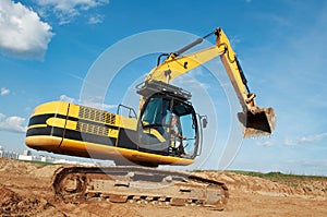 Loader excavator moving in a quarry