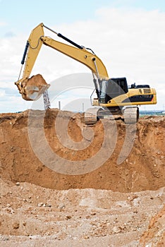 Loader excavator at sand quarry