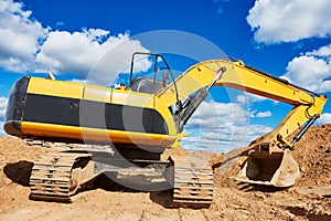 Loader excavator at sandpit earthmoving works