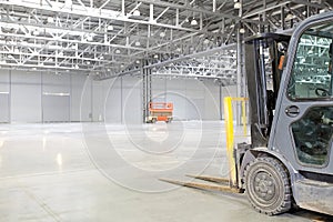 Loader in modern storehouse photo