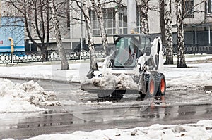 Loader removes snow photo