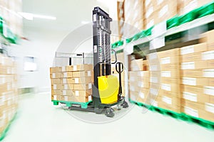 Loader stacker at warehouse photo