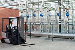 Loader and water pumps from boilers in an industrial greenhouse