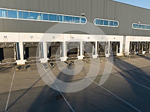 Loading bay dock, Warehouse loading and unloading for distribution. Trucks transport company business. Commercial