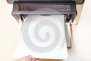 Loading of blank paper sheets in printer tray
