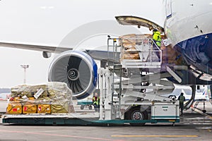 Loading cargo into the aircraft before departure