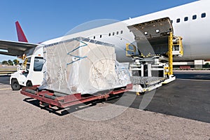 Loading cargo plane