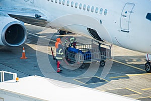 Loading cargo into plane before flight