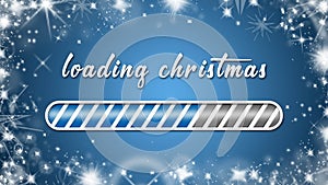 Loading christmas greeting card - white lettering and loading bar on blue background framed with white snow flakes and ice stars