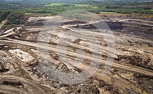 Loading coal into body truck. Mining truck mining machinery,to transport coal. Indonesia coal mining. aerial view.