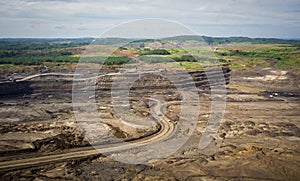 Loading coal into body truck. Mining truck mining machinery,to transport coal. Indonesia coal mining. aerial view.