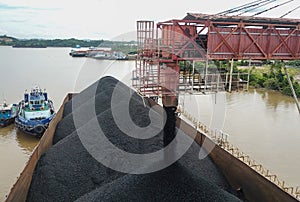 Loading coal onto the barge from the stock pile, aerial view