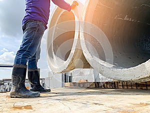 Loading concrete pipe on the trailer floor