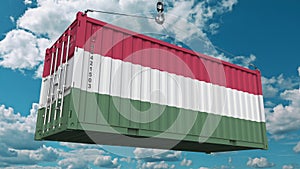 Loading container with flag of Hungary. Hungarian import or export related conceptual 3D rendering