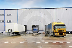 Loading docks in warehouse with truck