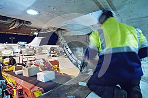 Loading freight into cargo hold of aircraft