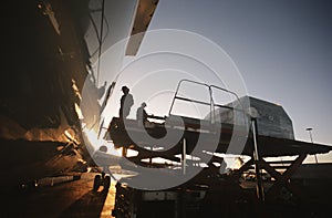 Loading freight onto Boeing 727 jet aircraft