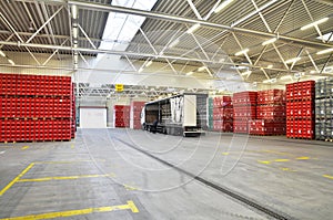 Loading of goods in a brewery warehouse - beer crates with beer