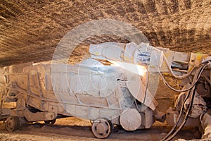 Loading machine in a mine