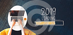 Loading new year 2019 with person using a laptop