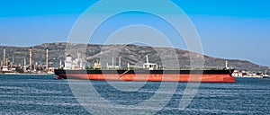 Loading oil supertanker