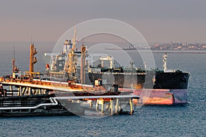 Loading oil supertanker